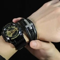 Cross fiberlæder armbånd.