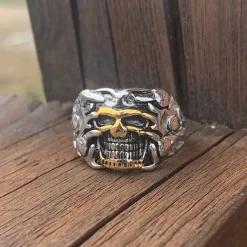 Golden smile skullring i stål.