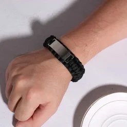 Kraftigt knyttet bomulds armbånd med mat stål