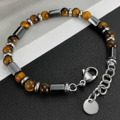 Muriz perlearmbånd med hematit og tiger eye