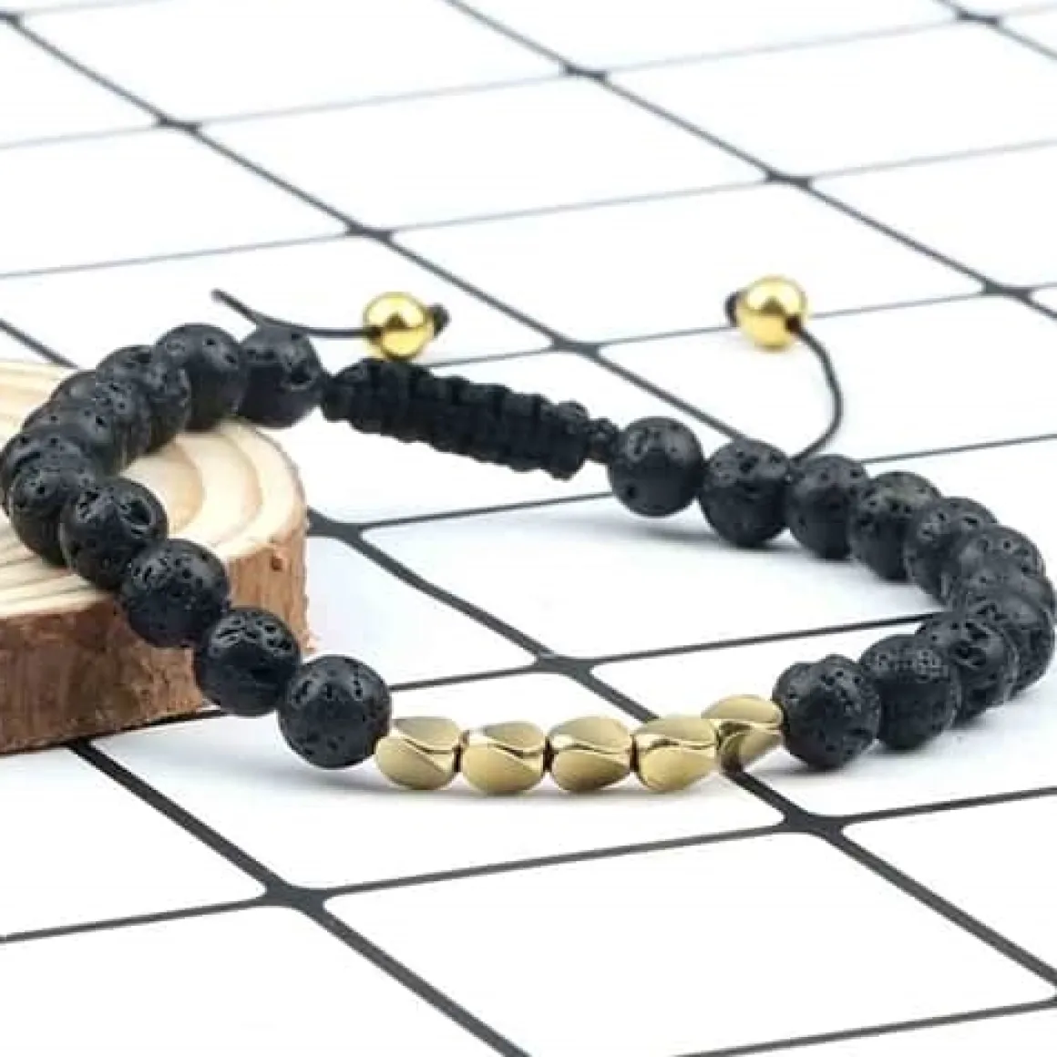 Niazy sort perlearmbånd / Lava golden