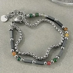 Stack armbånd med kæde og perler.