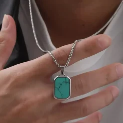 Turkis tag halssmykke i ædelstål.